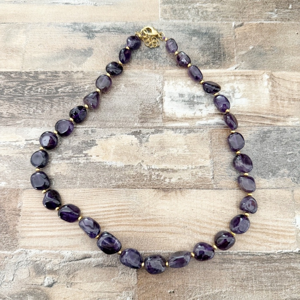 Purple stone and gold toned necklace